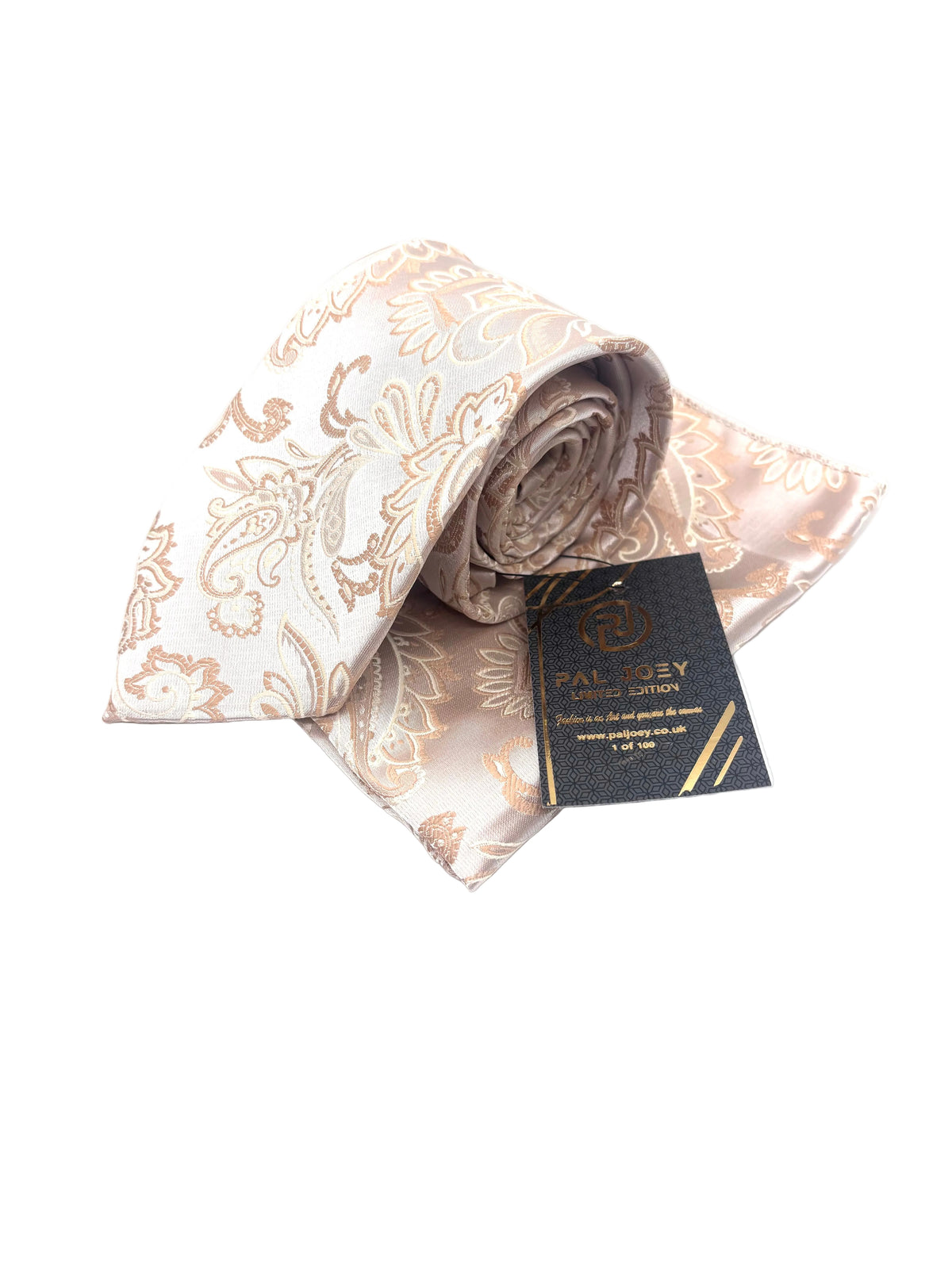 A rolled silk necktie with a beige and gold paisley pattern, displayed on a white background with its black brand tag.